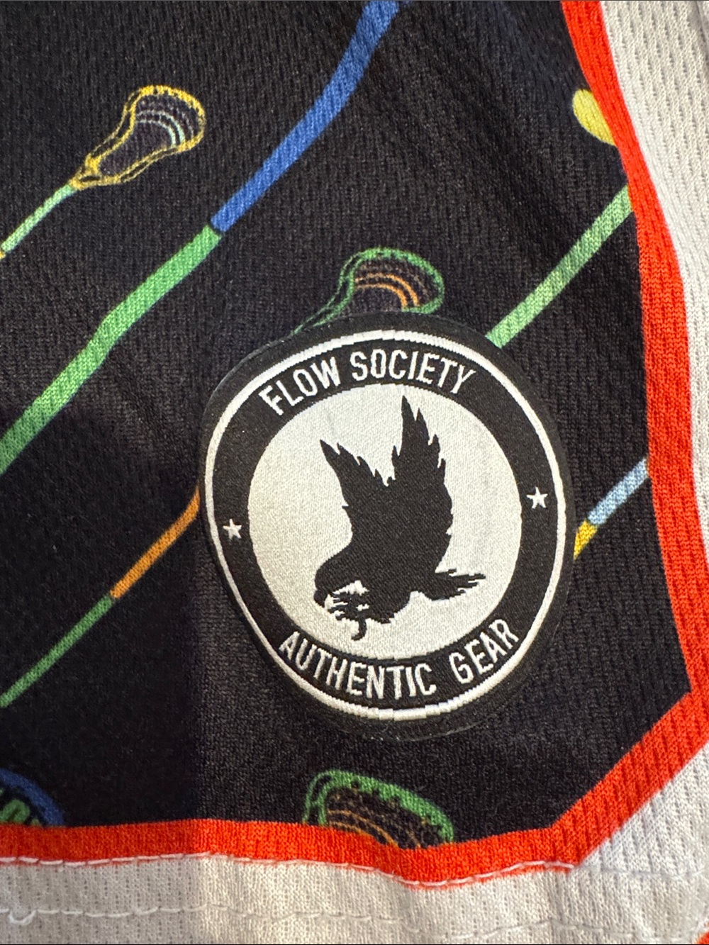 Flow Society Black Lacrosse Print Athletic Shorts with orange trim - Picture 2 of 3